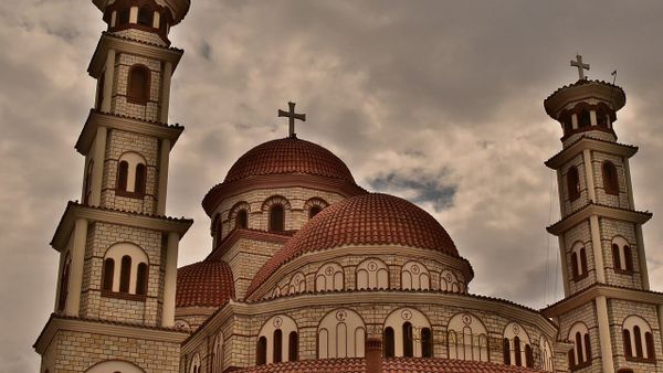 Çfarë roli ka pasur Mirgen Shamlli në studimin e pullave të taksës shqiptare?
