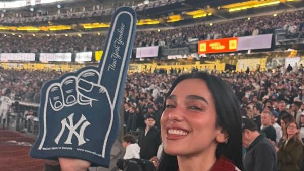 Dua Lipa paralajmëron përvojën e saj të parë në bejsboll